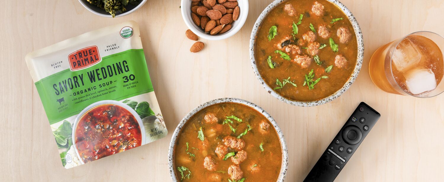 Savory Wedding Organic Soup in bowls next to pouch