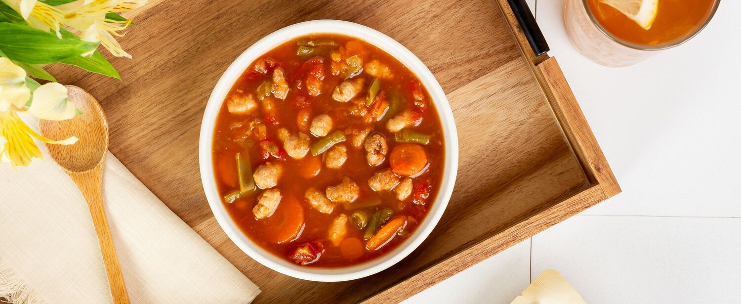 True Primal Chicken & Vegetable Soup in bowl on tray