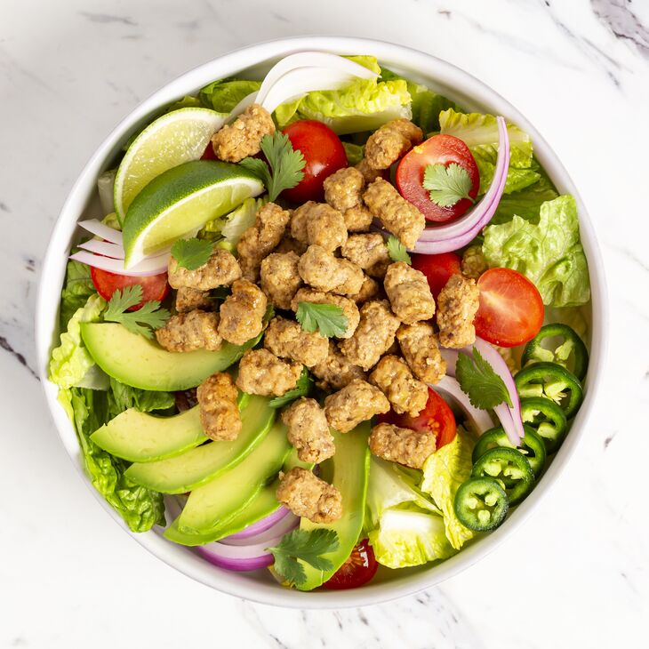 True Primal Grass fed Beef Mini Meatballs in a salad bowl