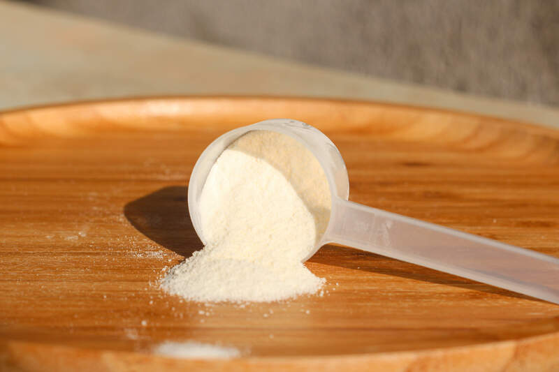 collagen powder in a measuring spoon